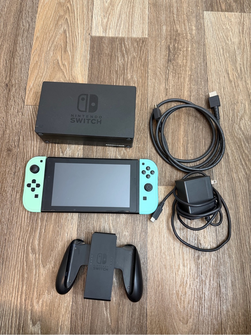 Nintendo Switch Console with Neon Turquoise Joy-Con Controllers